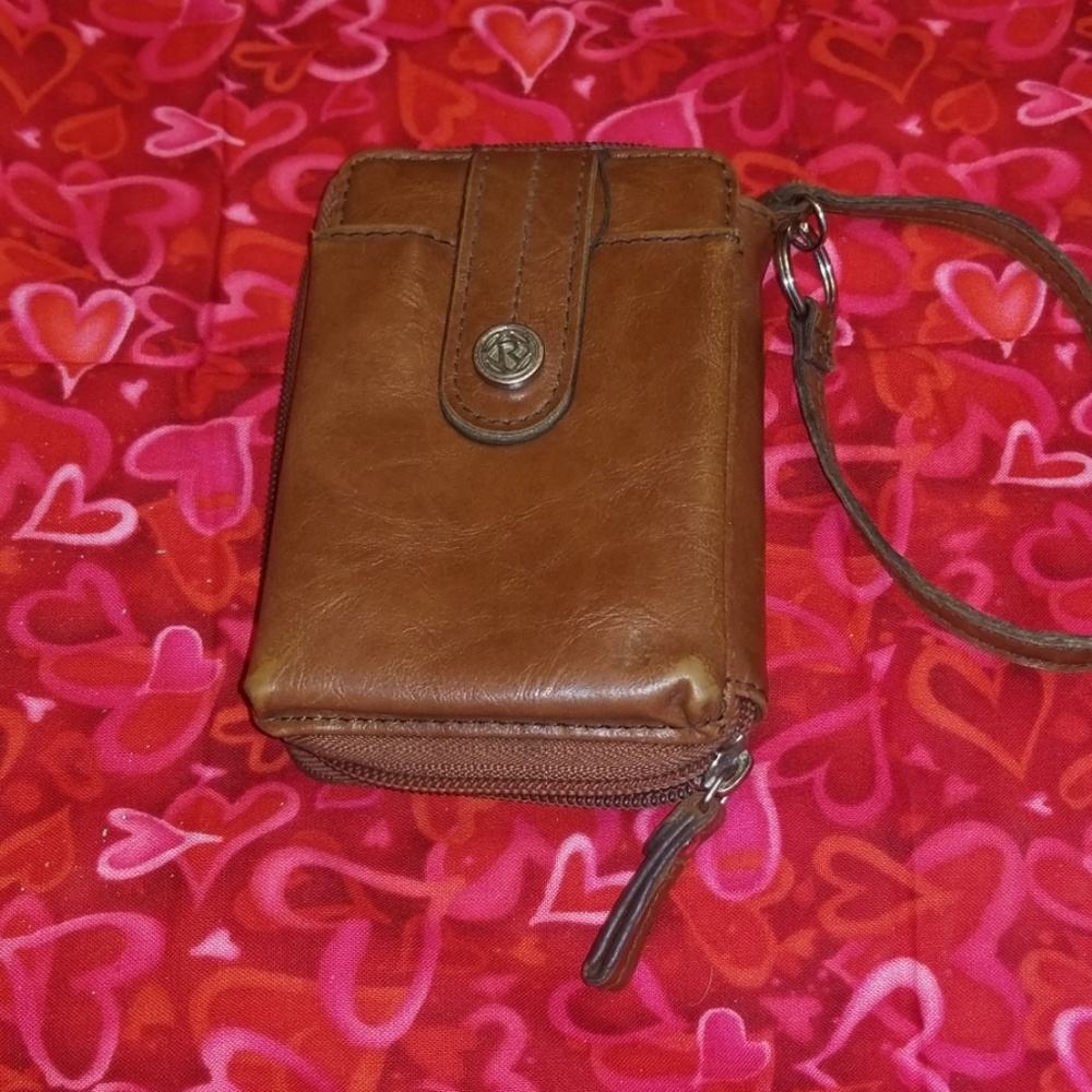 Wristlet wallet. By Relic, fossil.